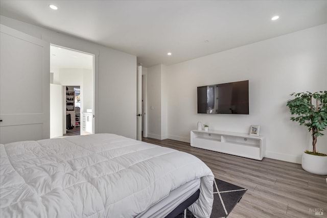 bedroom featuring wood-type flooring