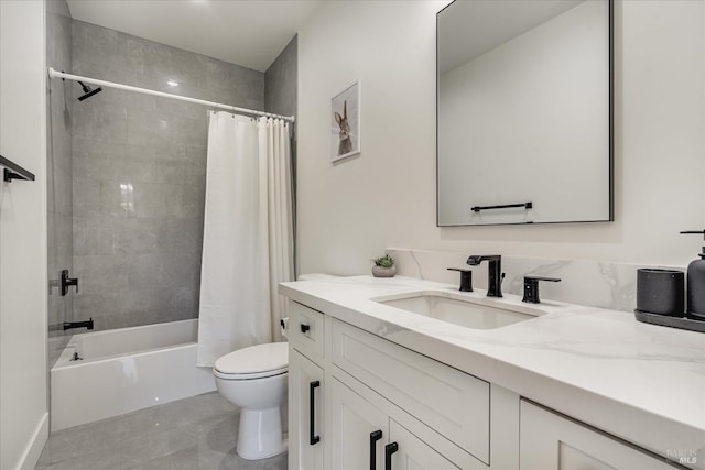 full bathroom with tile floors, vanity, shower / bath combo, and toilet