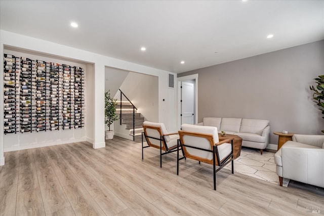 living room with light hardwood / wood-style flooring