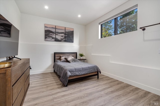 bedroom featuring light hardwood / wood-style flooring