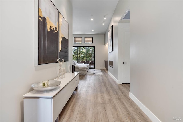 hallway featuring light wood-type flooring