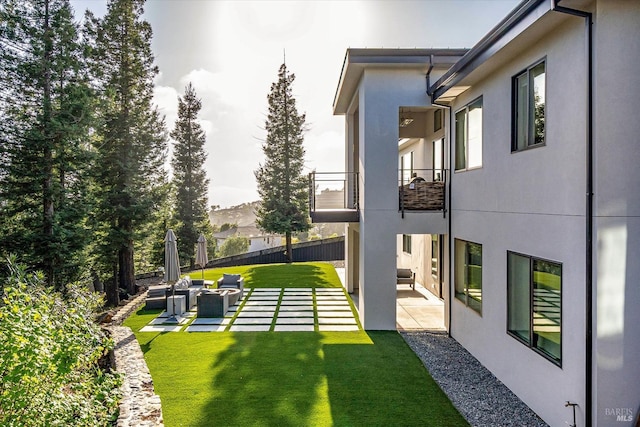 view of yard with a patio area and an outdoor hangout area