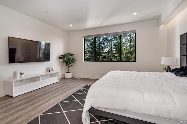 bedroom featuring hardwood / wood-style floors