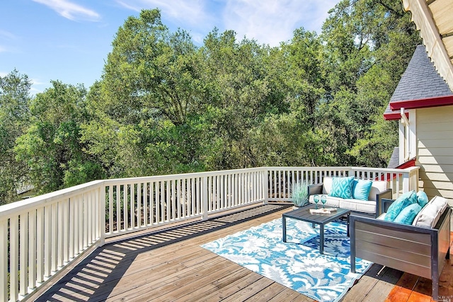 wooden deck featuring an outdoor living space