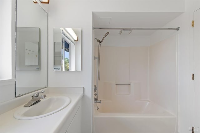 bathroom with shower / tub combination and vanity