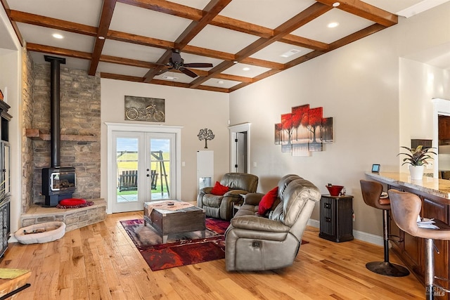 interior space featuring wood-type flooring, ceiling fan, and built in desk