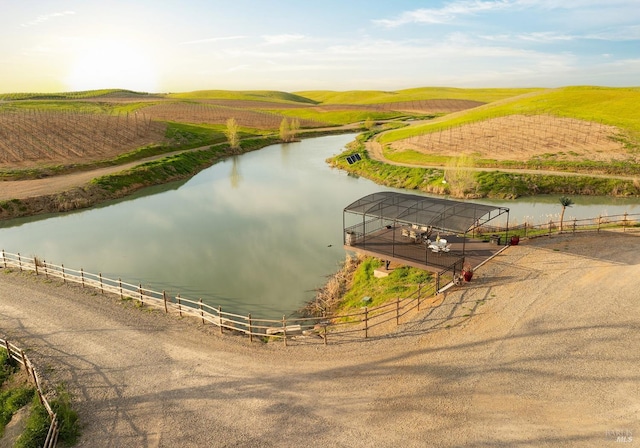 birds eye view of property with a rural view