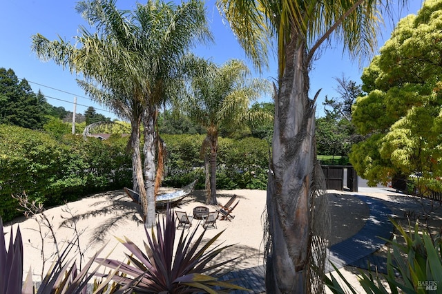 wooden terrace featuring a patio area