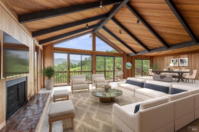 living room with wooden ceiling, beamed ceiling, high vaulted ceiling, a mountain view, and wooden walls