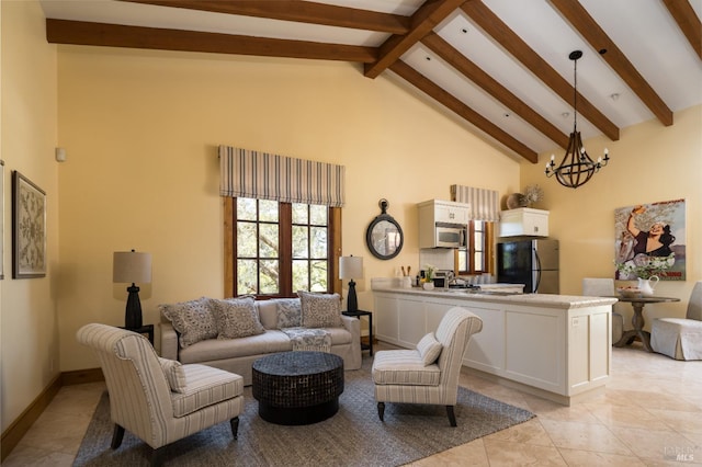 living room featuring light tile patterned floors, sink, high vaulted ceiling, a notable chandelier, and beamed ceiling