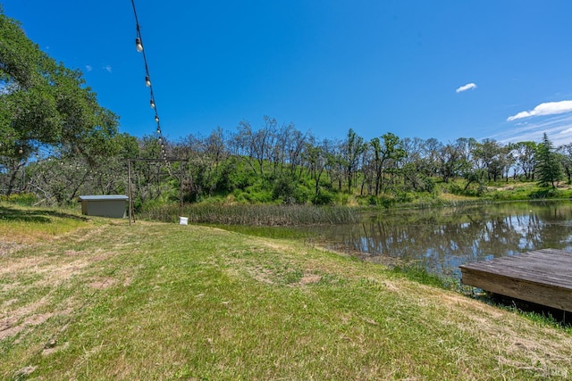 view of yard with a water view