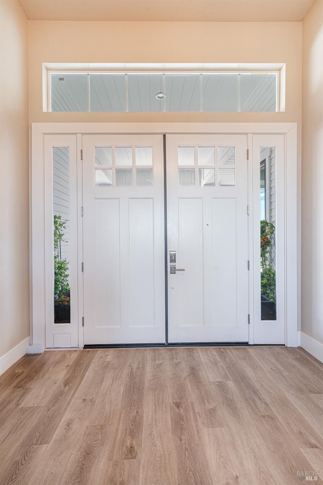 foyer featuring light hardwood / wood-style floors