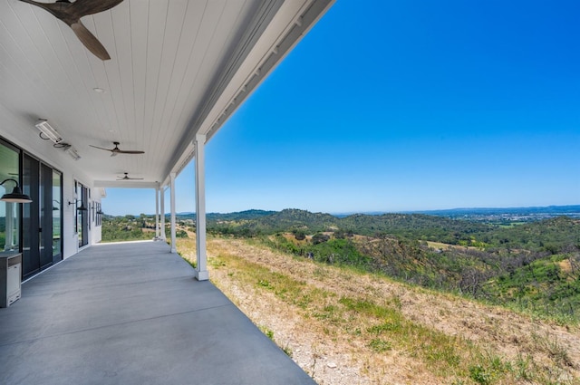 view of patio / terrace featuring ceiling fan