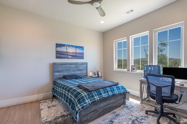 carpeted bedroom with access to outside and ceiling fan