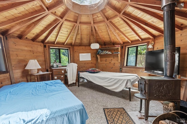 bedroom with wood ceiling, lofted ceiling with beams, and multiple windows