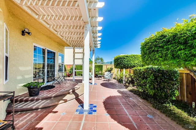 view of patio featuring a pergola