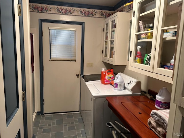 washroom with cabinets and independent washer and dryer