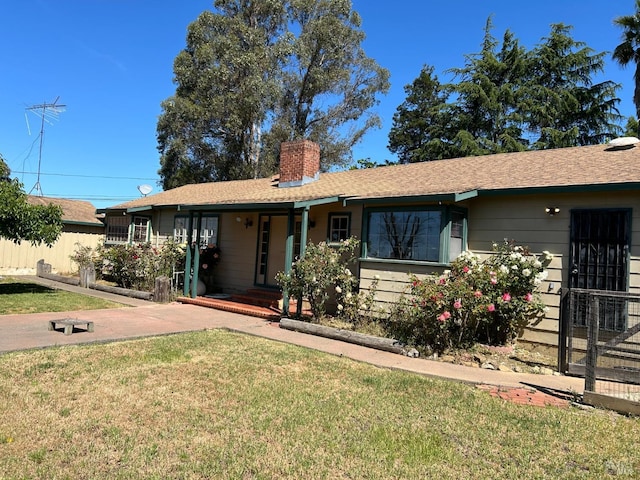 ranch-style house with a front yard