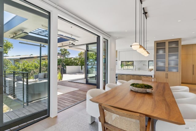 431 E Strawberry Dr, Mill Valley, CA 94941 - dining room with healthy amount of natural light and light wood-type flooring