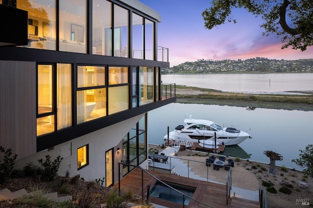 view of dock with a water view