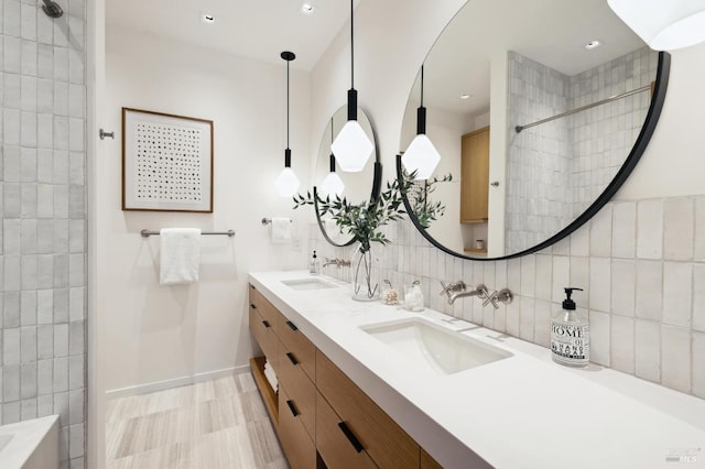 431 E Strawberry Dr, Mill Valley, CA 94941 - bathroom with double vanity, a tile shower, a tub to relax in, backsplash, and recessed lighting