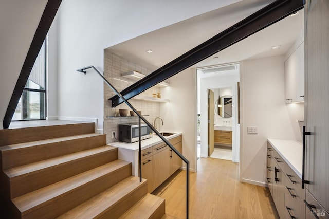 431 E Strawberry Dr, Mill Valley, CA 94941 - stairway with wood finished floors and baseboards