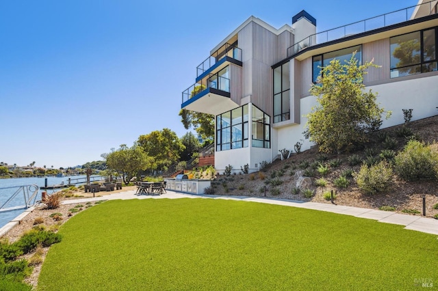 431 E Strawberry Dr, Mill Valley, CA 94941 - view of green lawn featuring a balcony and a water view