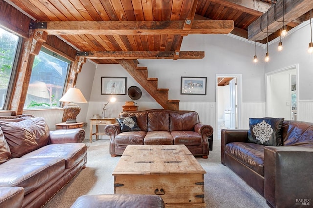 carpeted living area featuring wooden ceiling, lofted ceiling with beams, stairway, and wainscoting