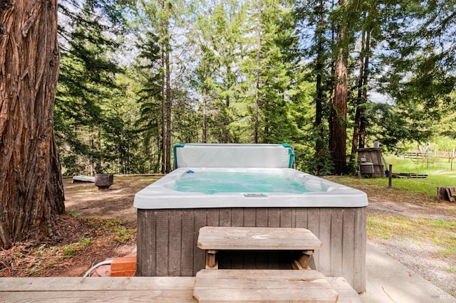 exterior space featuring a hot tub