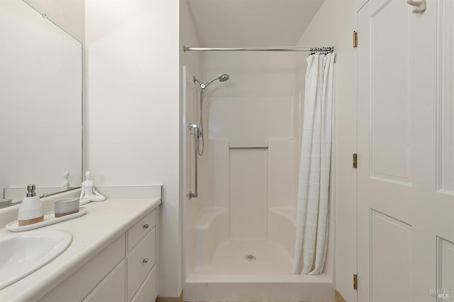 bathroom with a shower with curtain and oversized vanity