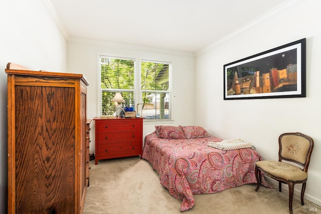 bedroom featuring ornamental molding and light colored carpet