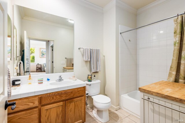 bathroom with tile patterned flooring, toilet, shower / tub combo, vanity, and ornamental molding