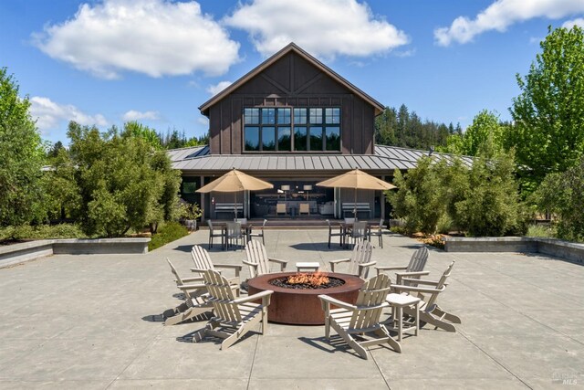 view of patio featuring a fire pit