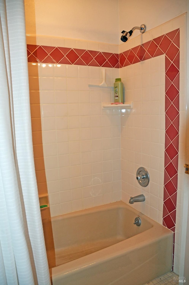 bathroom featuring tile flooring and shower / tub combo