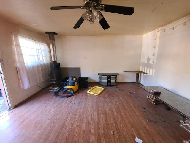 miscellaneous room featuring ceiling fan and hardwood / wood-style flooring