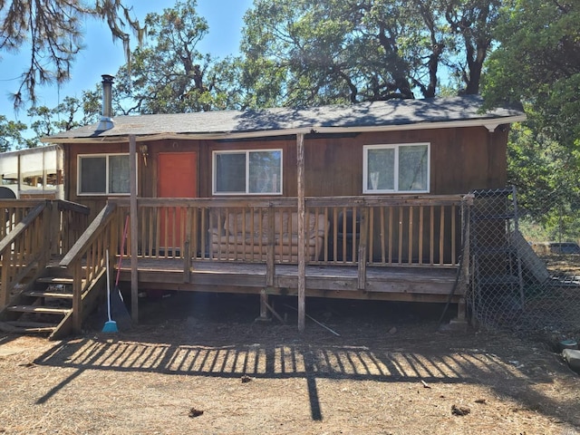 rear view of house with a deck