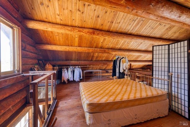 bedroom with rustic walls, beamed ceiling, wooden ceiling, and hardwood / wood-style flooring