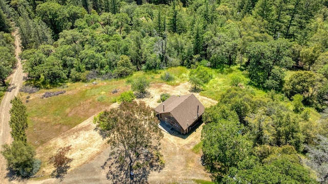 drone / aerial view with a forest view