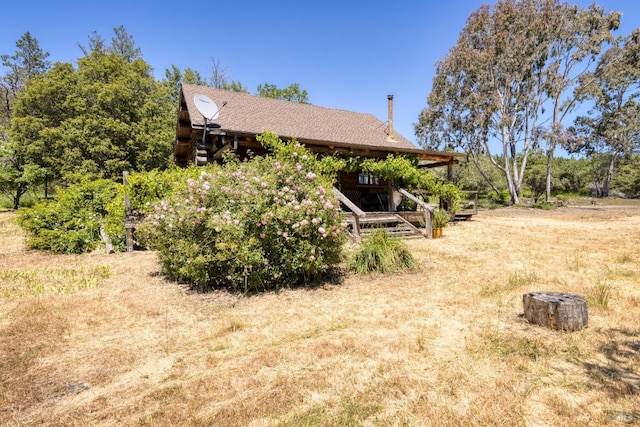 exterior space featuring log siding