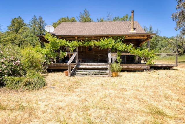 view of front of house featuring a wooden deck