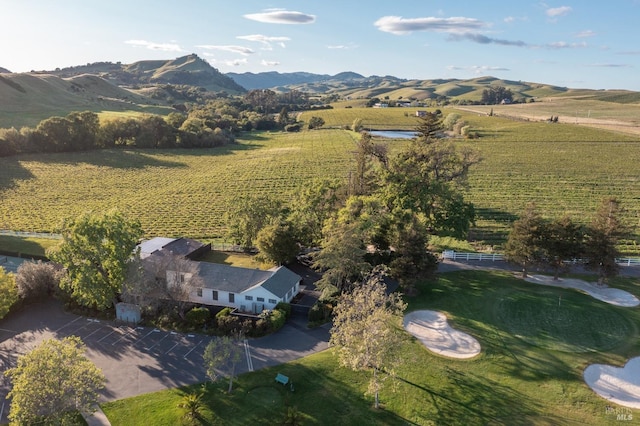 birds eye view of property with a rural view and a mountain view