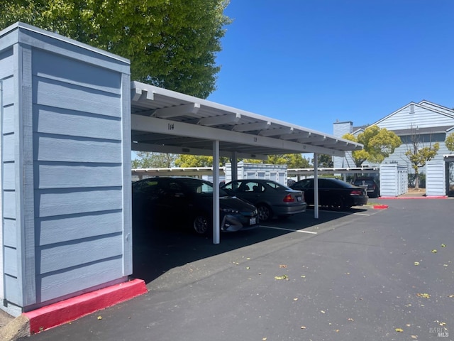 view of car parking with a carport