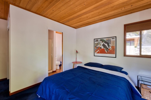 bedroom with connected bathroom, carpet floors, and wooden ceiling