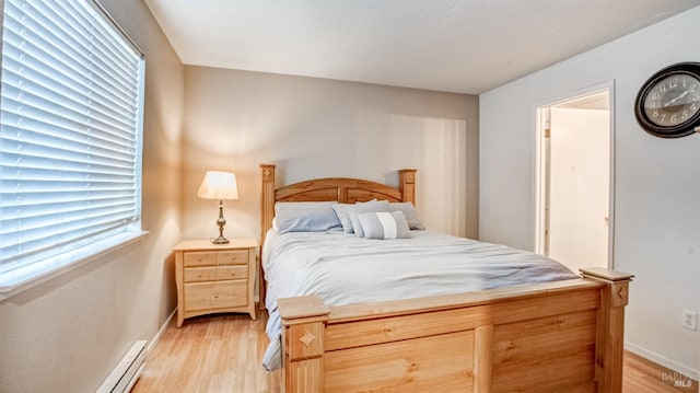 bedroom featuring light wood-type flooring