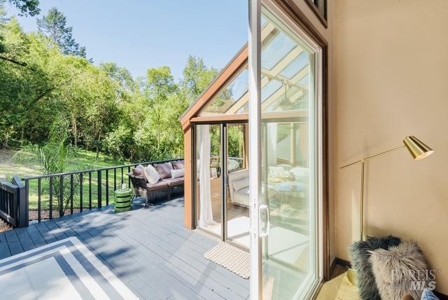 doorway to outside featuring wood finished floors