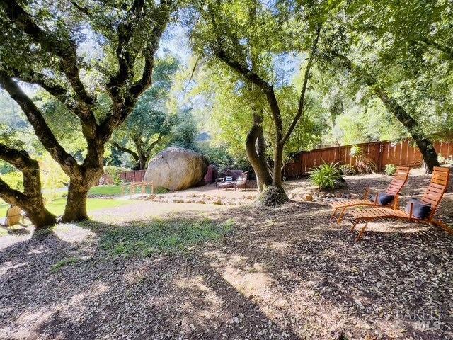 view of yard featuring fence