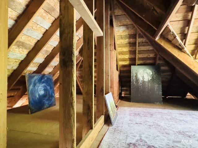 view of unfinished attic