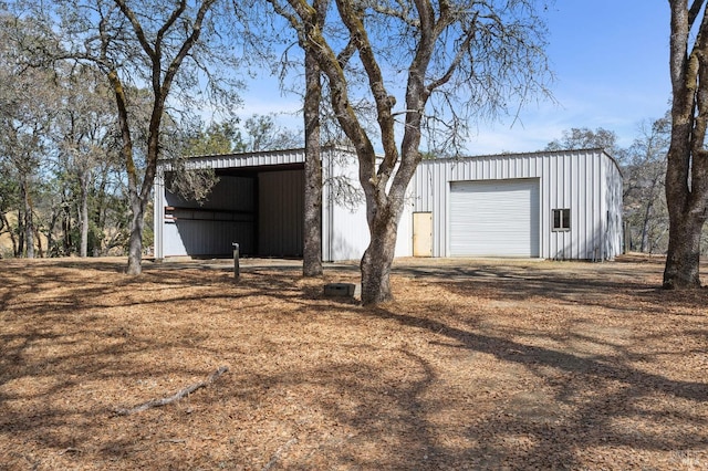 view of outbuilding with a garage