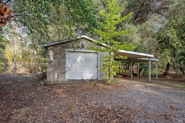 garage with a carport