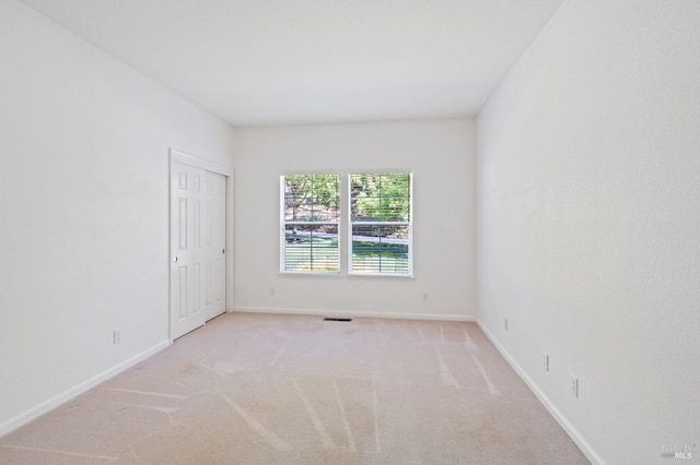 spare room with carpet flooring